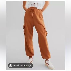 Gilded Intent (Buckle)  Rust Jogger Pants size medium.